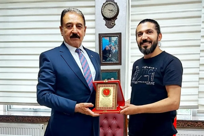 Dünya Şampiyona’ plaket